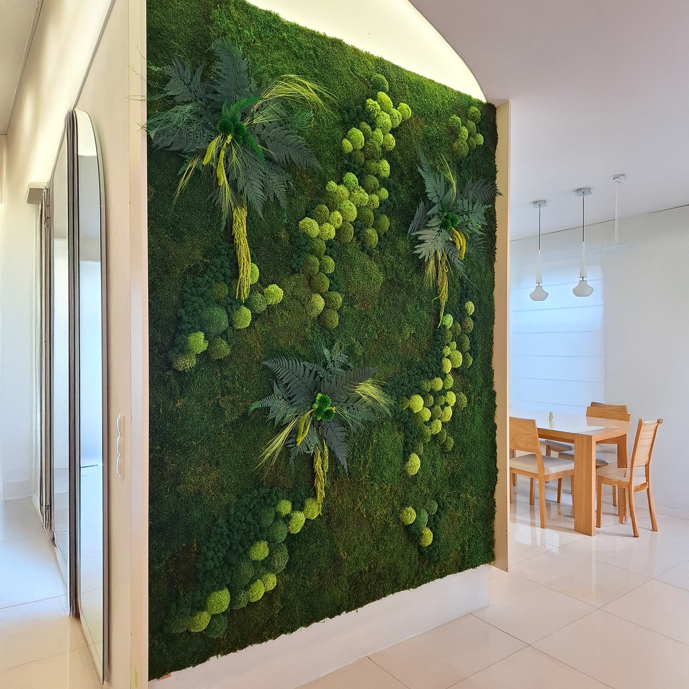 A wall of moss and stabilized plants